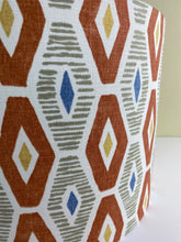 Load image into Gallery viewer, Drum Lampshade. Geometric orange, grey and blue graphic fabric print handrolled lampshade in 3 sizes
