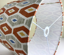 Load image into Gallery viewer, Drum Lampshade. Geometric orange, grey and blue graphic fabric print handrolled lampshade in 3 sizes
